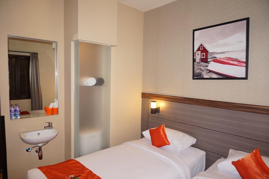 Ekon Hotel Yogyakarta Szoba fotó